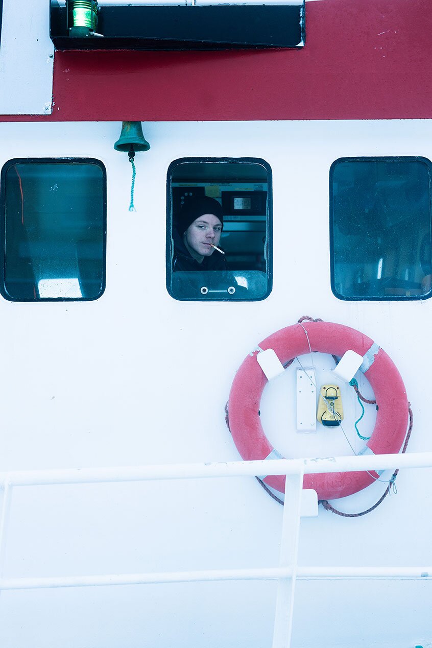 Pescador na casa do leme