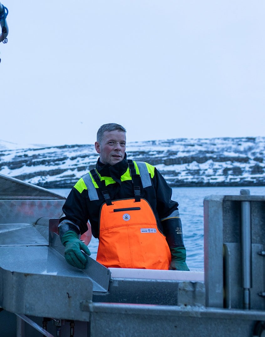 Pescador em um barco